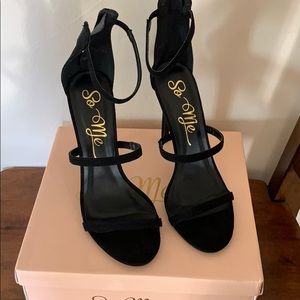 Black saddles heels.